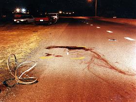 bicycle wheel moved, junk from another damaged vehicle on road