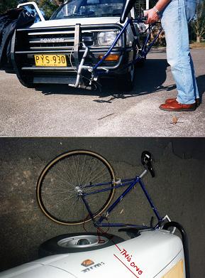 front portion of bicycle dragged under left front wheel of ute